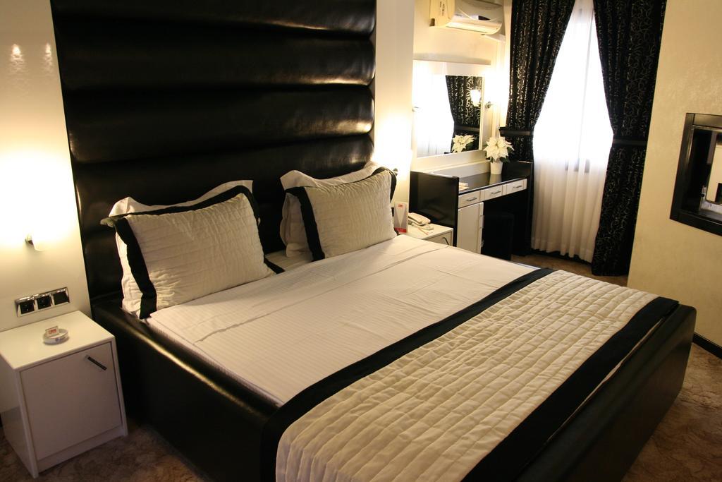 Aksan Hotel Измир Номер фото